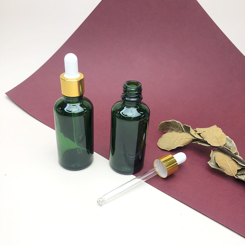 Wholesale green glass oil drop bottle private label beard oil drop ship glass bottle for essential oil
