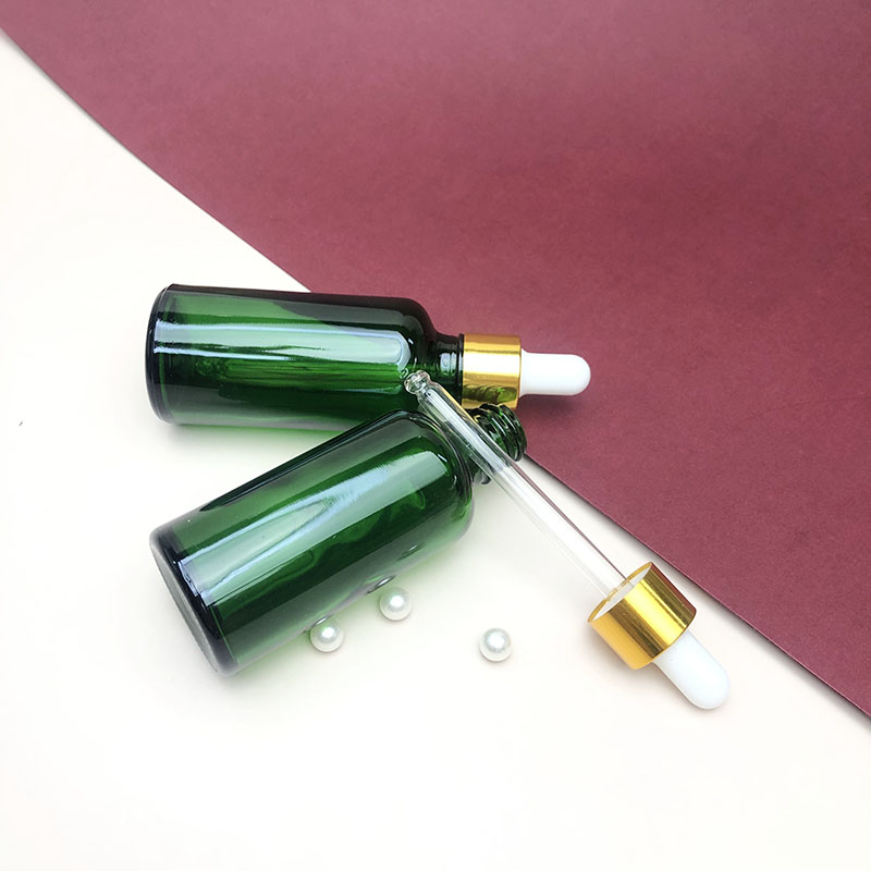 Wholesale green glass oil drop bottle private label beard oil drop ship glass bottle for essential oil