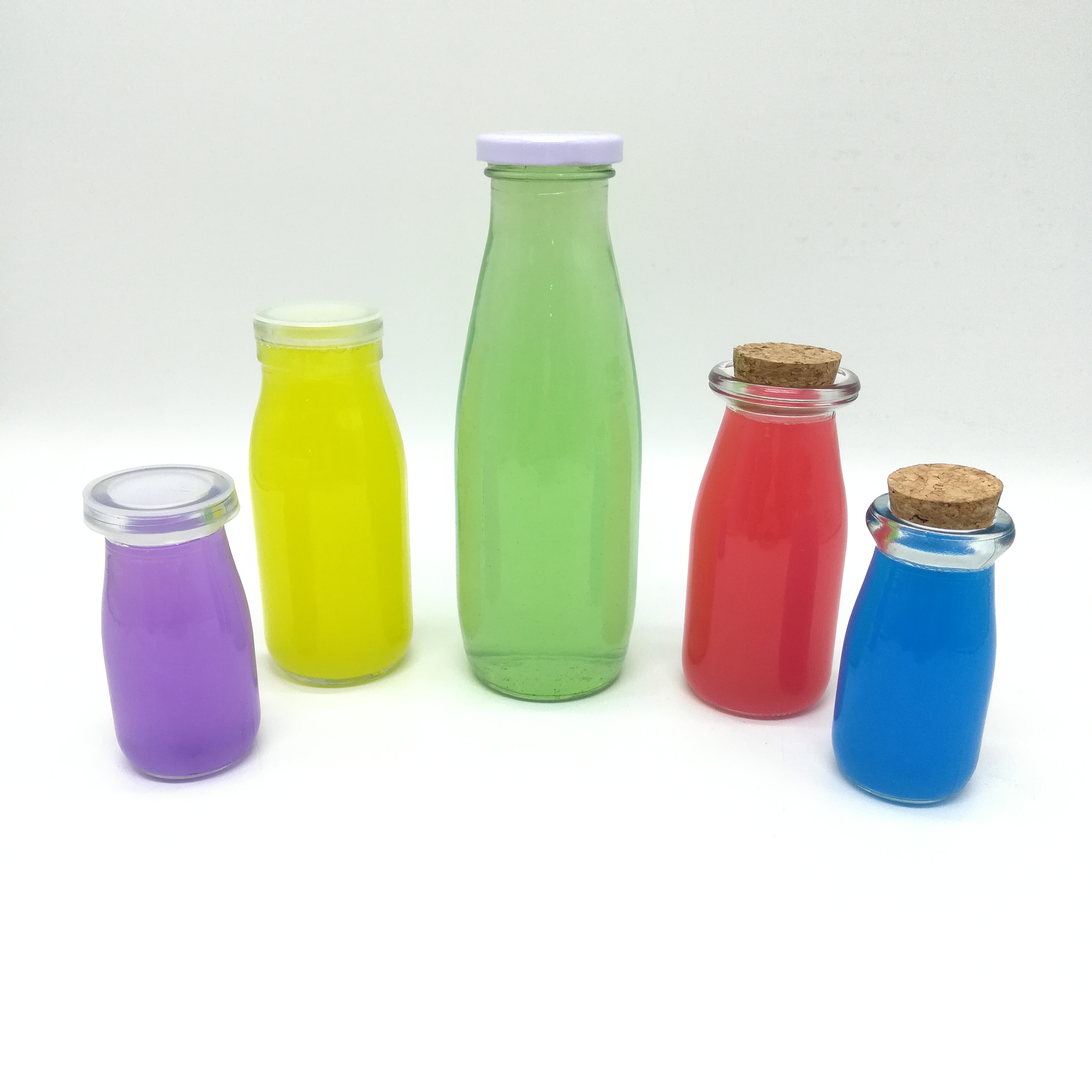 Wholesale heat-resistant 1liter round glass milk juice beverage bottles manufacturer with metal lid
