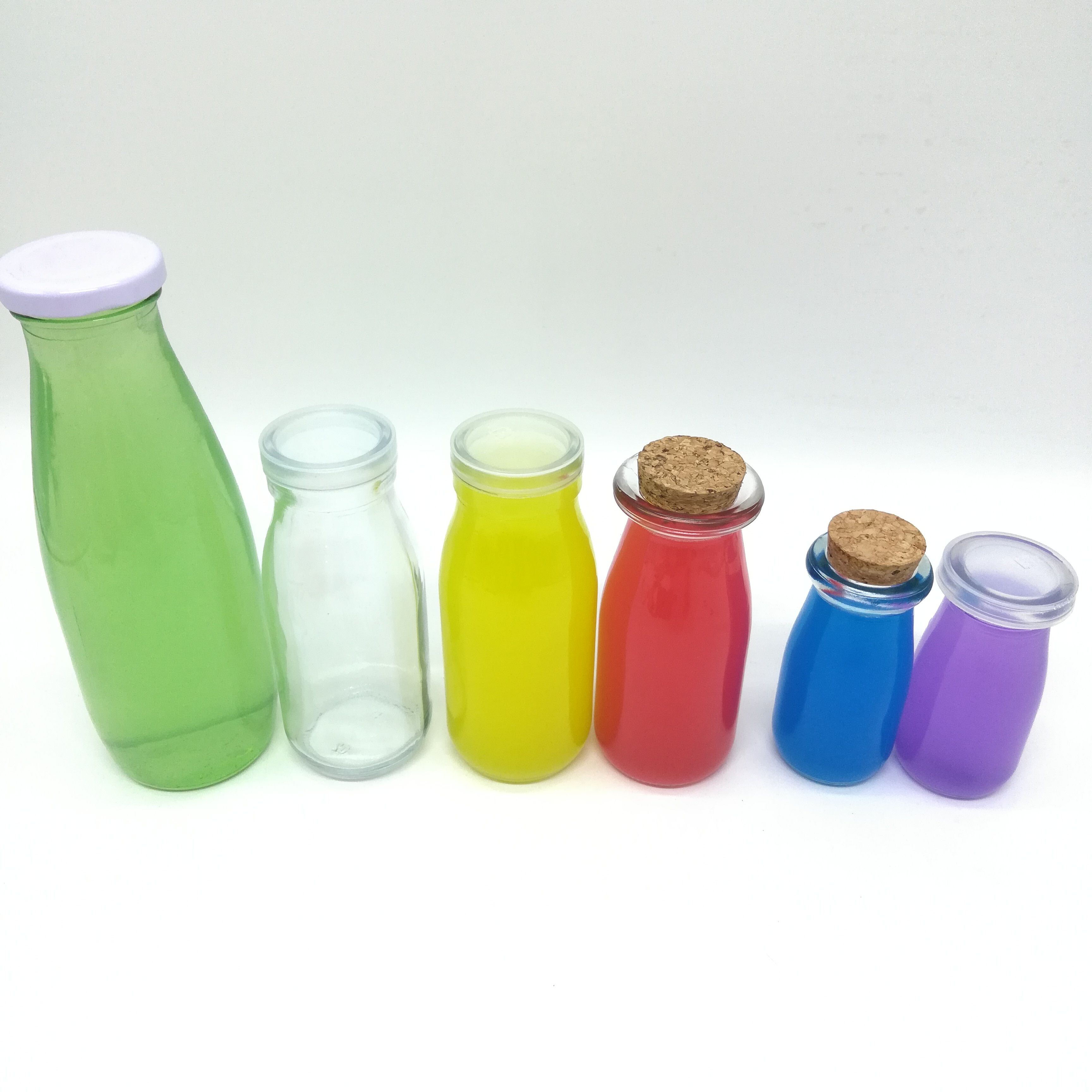 Wholesale heat-resistant 1liter round glass milk juice beverage bottles manufacturer with metal lid