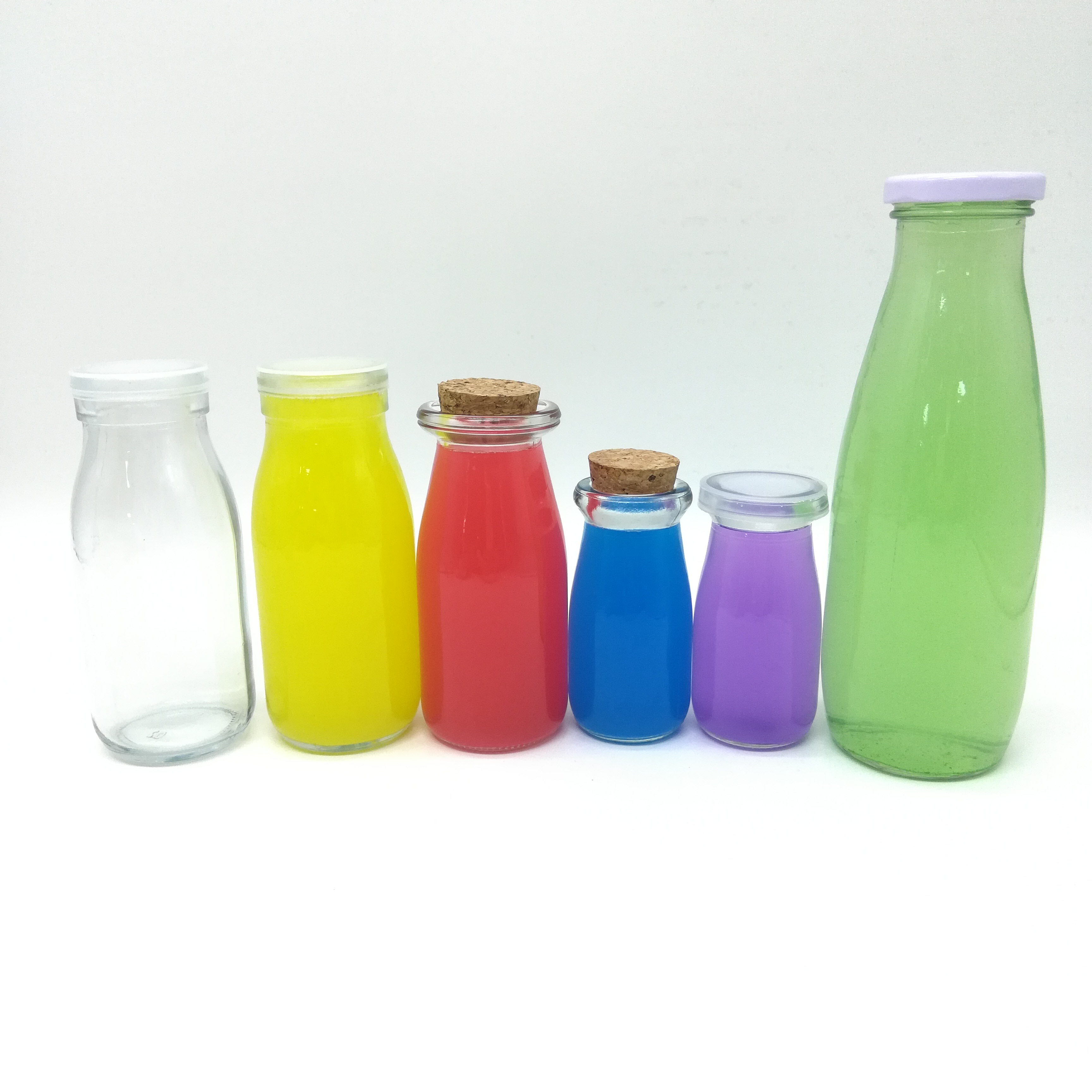 Wholesale heat-resistant 1liter round glass milk juice beverage bottles manufacturer with metal lid