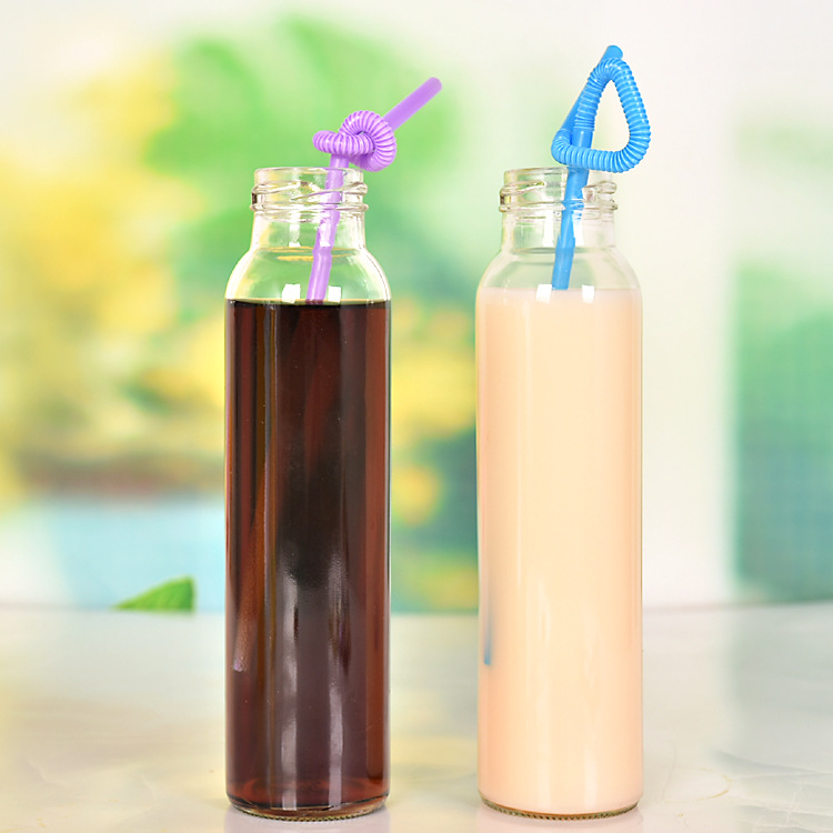 Wholesale heat-resistant 350 ml round glass bottle milk juice glass beverage bottles with mental lid