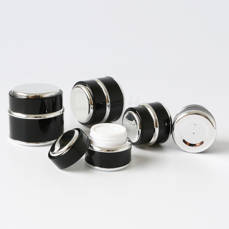 Wholesale high end double wall 50ml 50g round shape plastic black and gold herbal whitening face cream jar