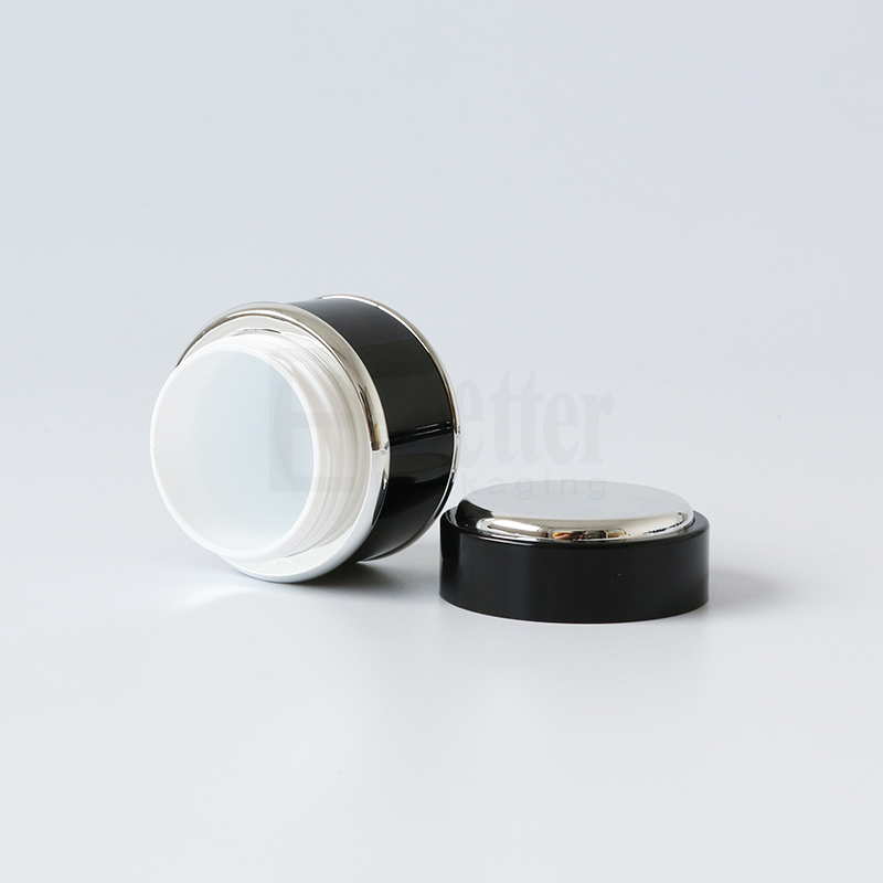 Wholesale high end double wall 50ml 50g round shape plastic black and gold herbal whitening face cream jar