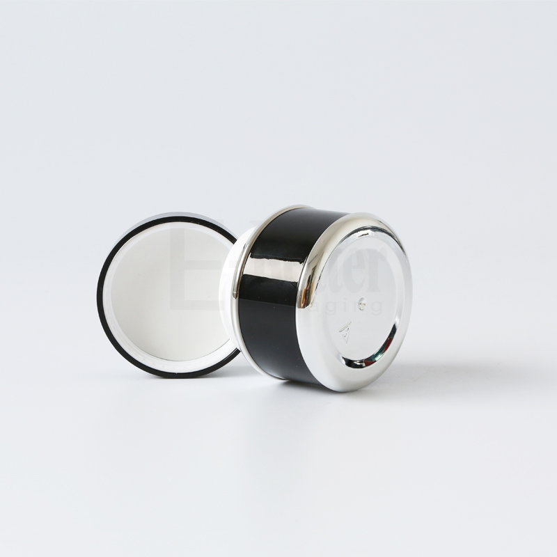 Wholesale high end double wall 50ml 50g round shape plastic black and gold herbal whitening face cream jar