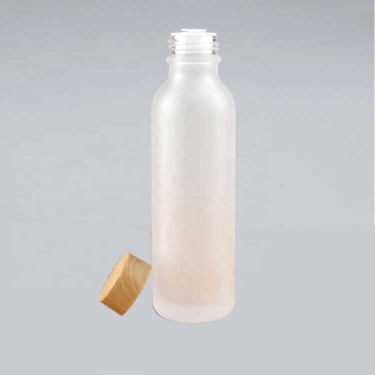 Wholesale high end frosted matte cream glass bottle