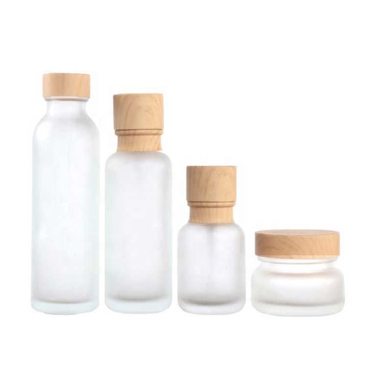 Wholesale high end frosted matte cream glass bottle