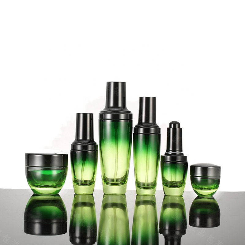 Wholesale high-grade round clear green cosmetics electroplating glass bottle/jars with good price