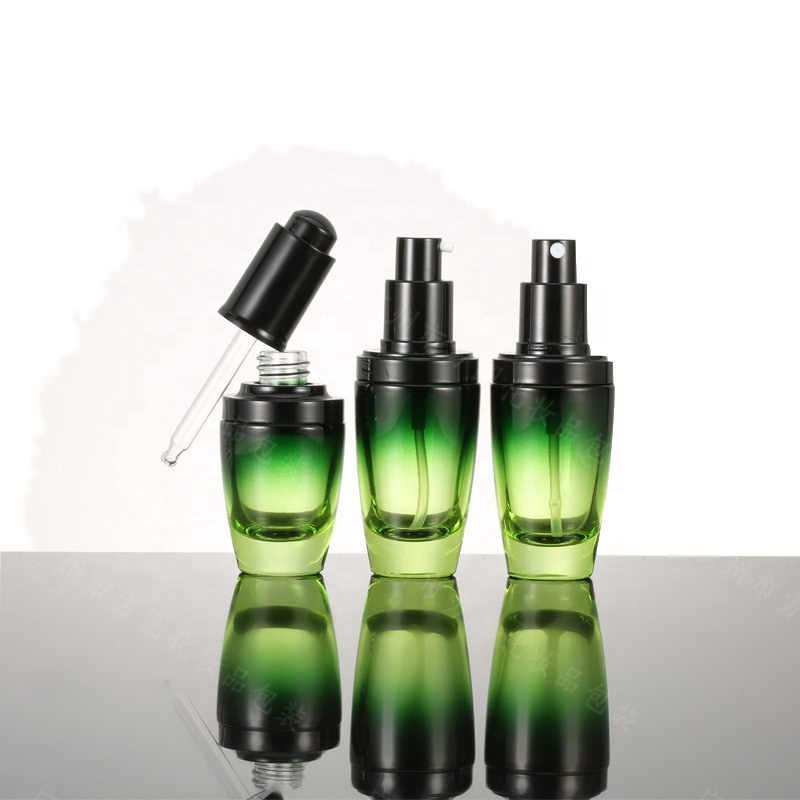 Wholesale high-grade round clear green cosmetics electroplating glass bottle/jars with good price