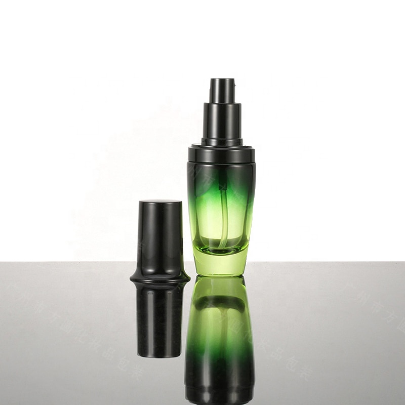 Wholesale high-grade round clear green cosmetics electroplating glass bottle/jars with good price