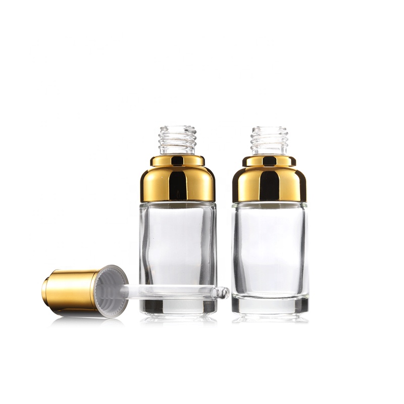Wholesale high quality eco friendly 30ml shoulder Press clear glass dropper bottle with silver