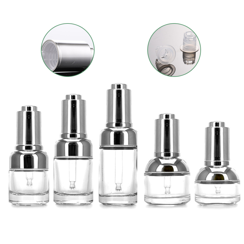 Wholesale high quality eco friendly 30ml shoulder Press clear glass dropper bottle with silver