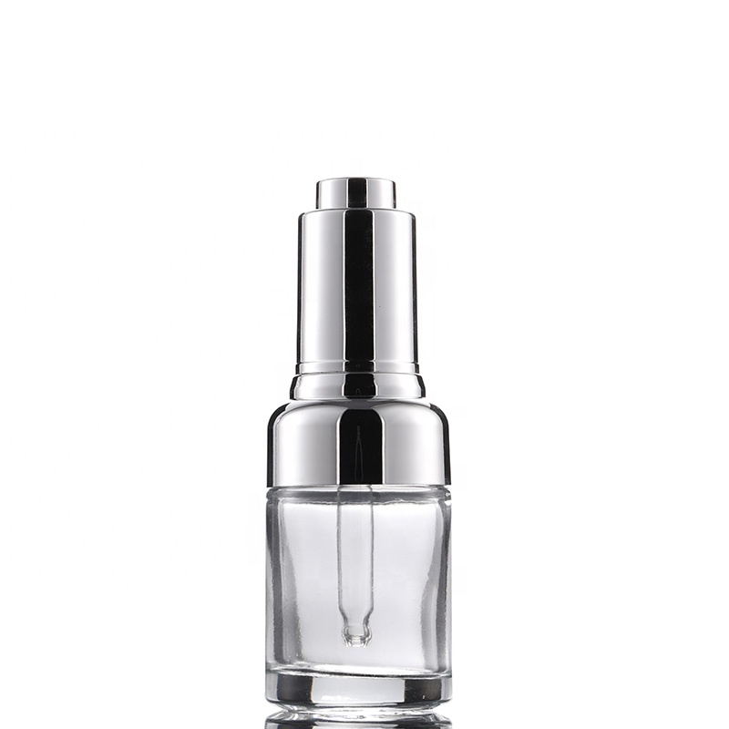 Wholesale high quality eco friendly 50ml 30ml 20ml clear glass dropper bottle with silver shoulder press pump lid