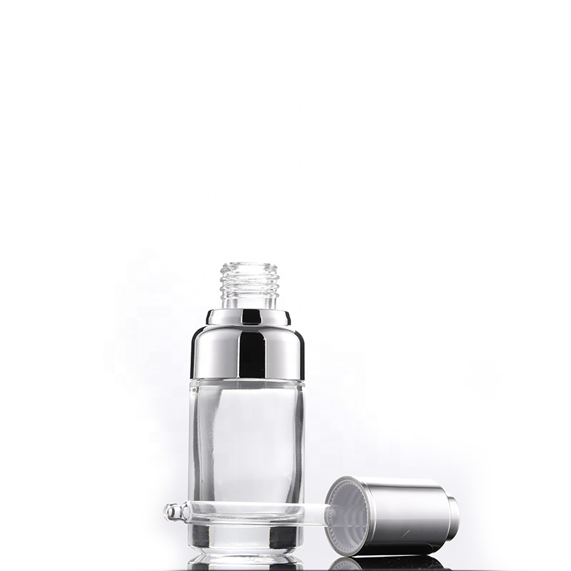 Wholesale high quality eco friendly 50ml 30ml 20ml clear glass dropper bottle with silver shoulder press pump lid