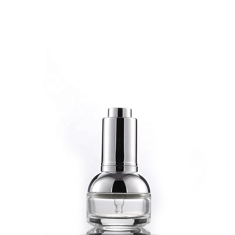 Wholesale high quality eco friendly 50ml 30ml 20ml clear glass dropper bottle with silver shoulder press pump lid
