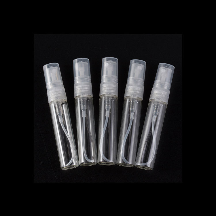 Wholesale inexpensive 2ml 3ml 5ml clear glass perfume tester with white mist spray plastic lids