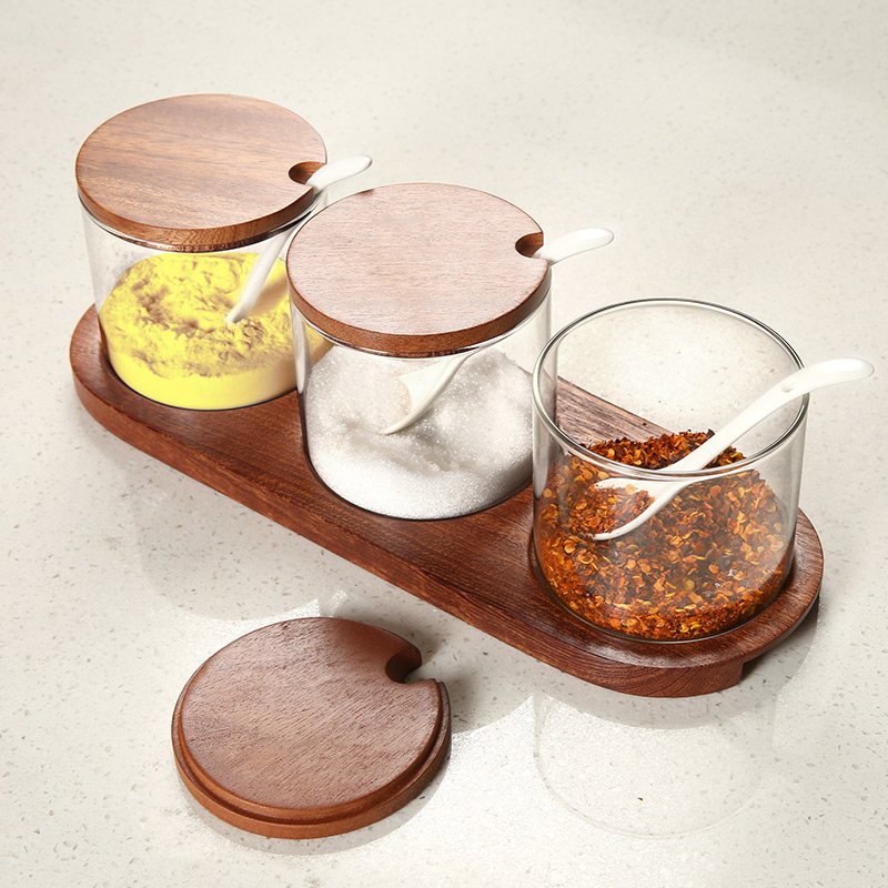 Wholesale kitchen seasoning boxes feature glass seasoning jars, wooden spoon lid and base for easy storage of three-piece sets