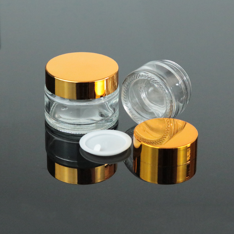 Wholesale manufacturer price 30ml glass lip balm jar 1 oz clear container gold top (GJM04)