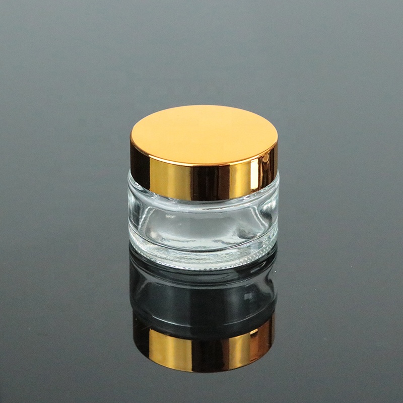 Wholesale manufacturer price 30ml glass lip balm jar 1 oz clear container gold top (GJM04)