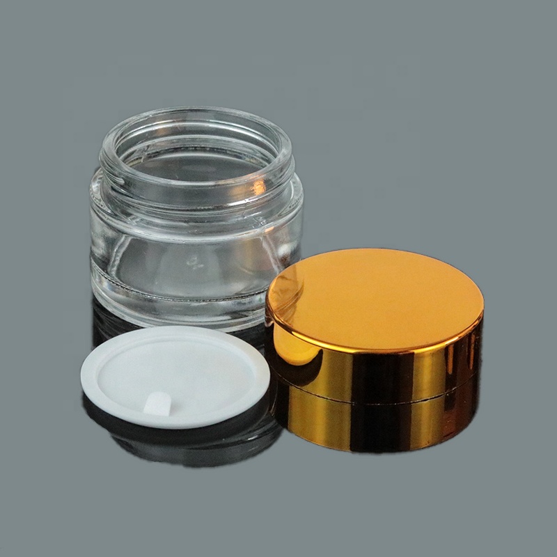 Wholesale manufacturer price 30ml glass lip balm jar 1 oz clear container gold top (GJM04)
