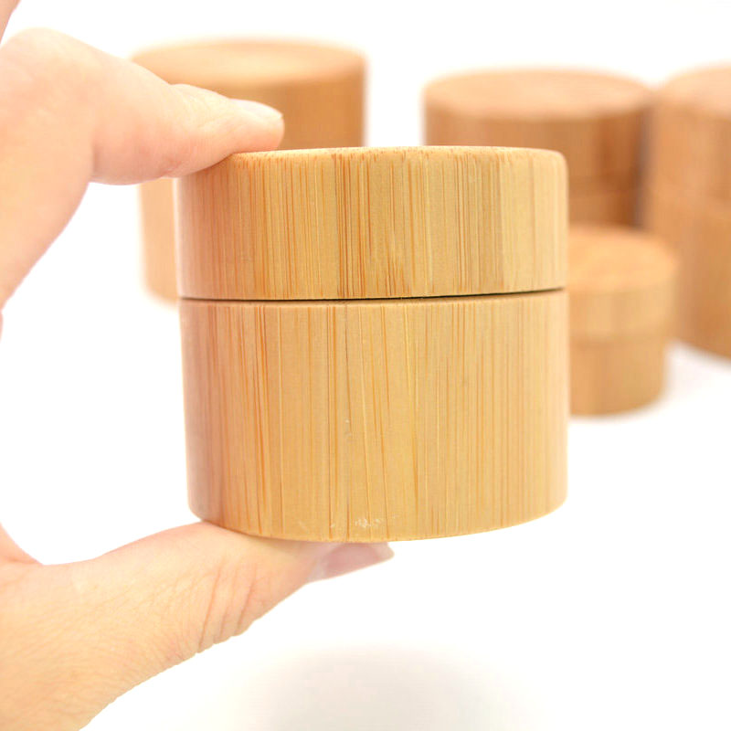Wholesale new design empty 10g 30g 50g 100g 150g custom cosmetic bamboo cream jars with PP inner for packaging