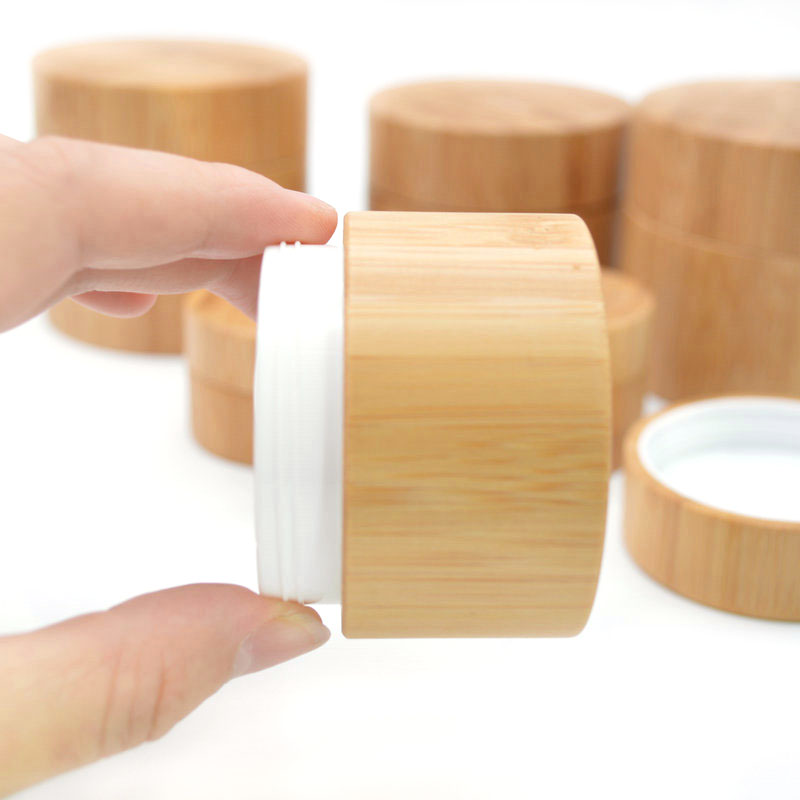 Wholesale new design empty 10g 30g 50g 100g 150g custom cosmetic bamboo cream jars with PP inner for packaging