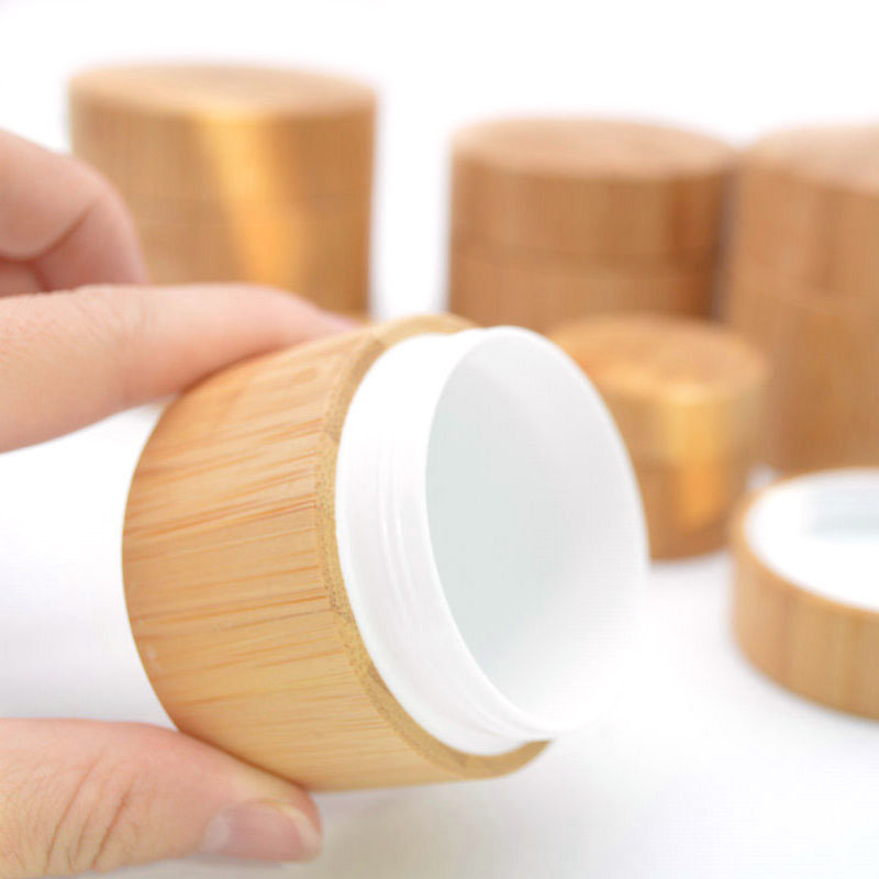 Wholesale new design empty 10g 30g 50g 100g 150g custom cosmetic bamboo cream jars with PP inner for packaging
