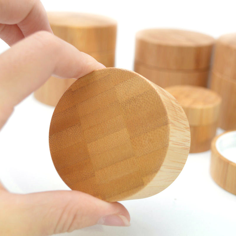 Wholesale new design empty 10g 30g 50g 100g 150g custom cosmetic bamboo cream jars with PP inner for packaging