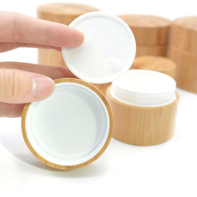 Wholesale new design empty 10g 30g 50g 100g 150g custom cosmetic bamboo cream jars with PP inner for packaging