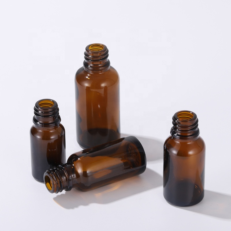 Wholesale personal care skin care cosmetic glass amber glass bottle liquid spray pump bottle