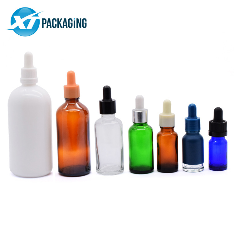 Wholesale price customized blue glass dropper bottle essential oil bottle child resistant with scale glass pipette 15ml 20ml