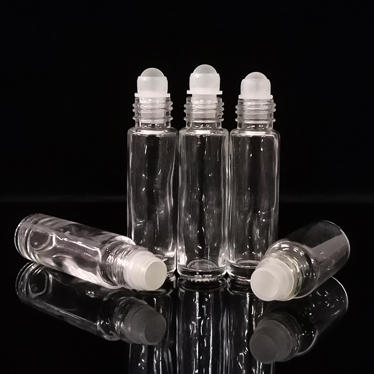 Wholesale roller ball bottle clear frosted essential oil 10ml empty glass roller bottle with plastic cap