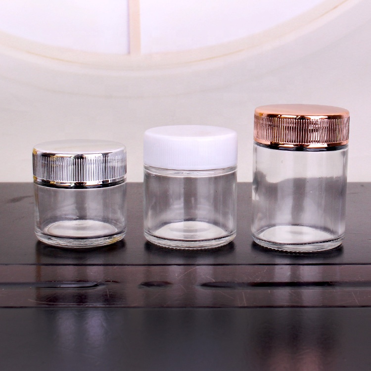Wholesale round 1oz 3oz 4oz child safe glass food spice jar with electroplating gold childproof lid
