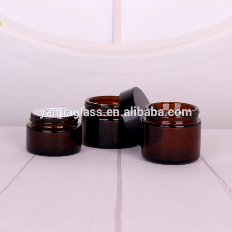 Wholesale round 60ml 2oz amber glass jar for skin care