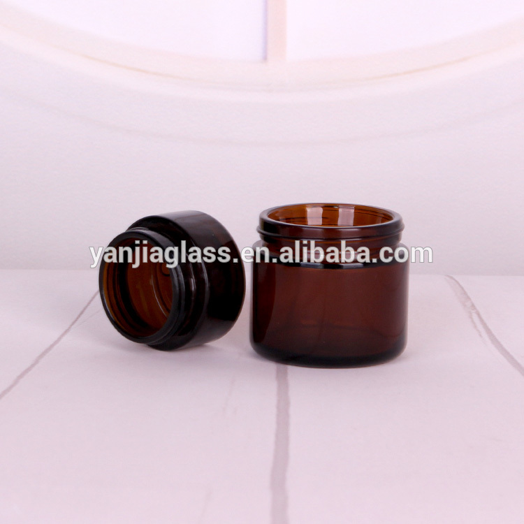 Wholesale round 60ml 2oz amber glass jar for skin care