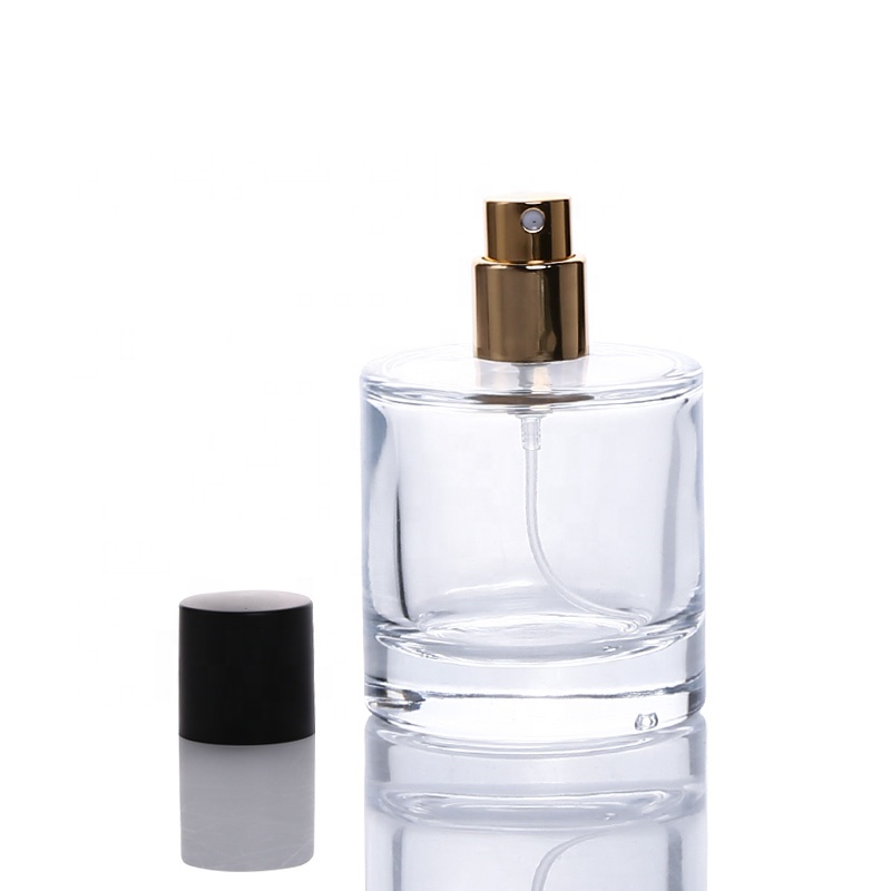 Wholesale round glass 50ml 100ml perfume bottle with black cap