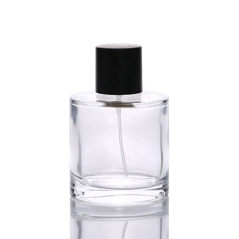 Wholesale round glass 50ml 100ml perfume bottle with black cap