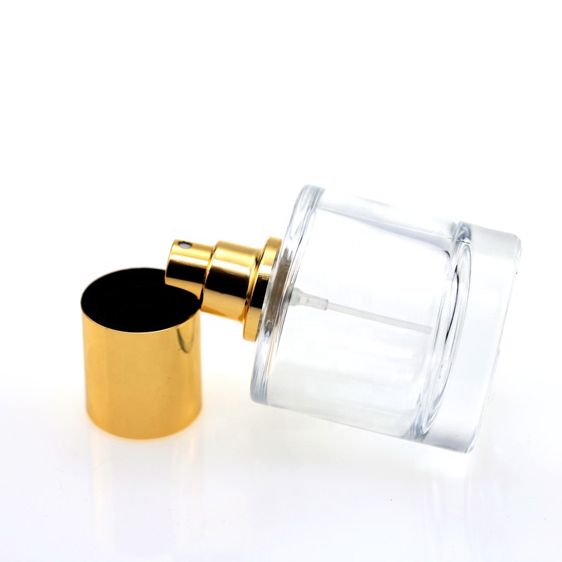 Wholesale round glass 50ml 100ml perfume bottle with black cap