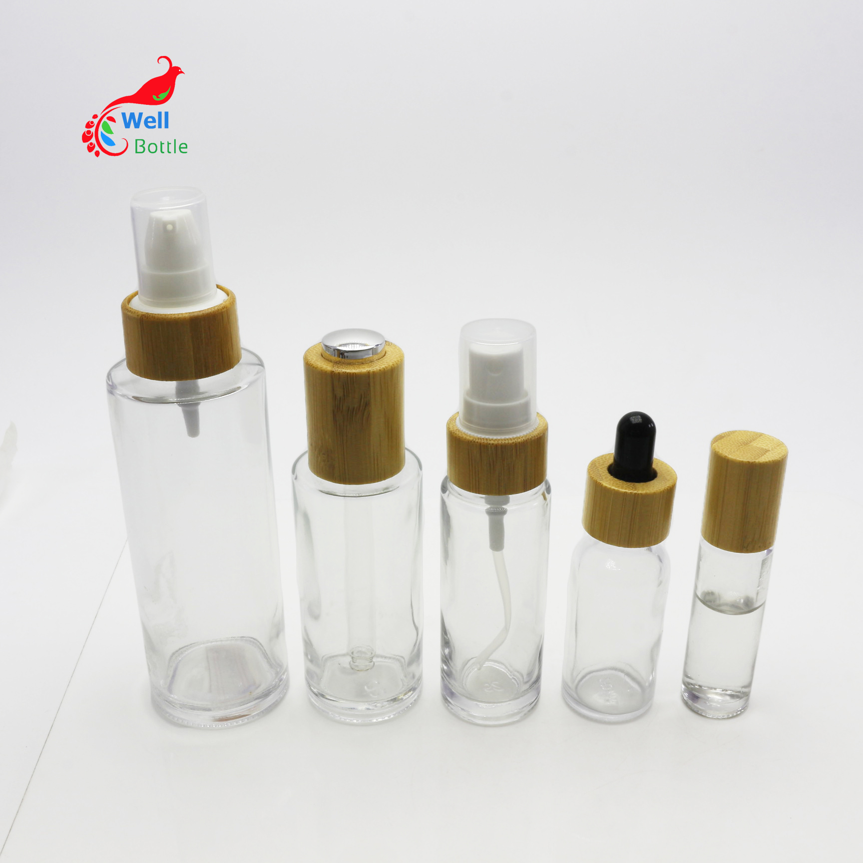 Wholesale round pump glass bottle with lotion bamboo pump top GB316E