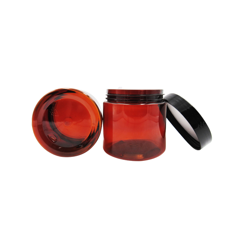 Wholesale simple style 50ml 80ml 100ml 140ml 200ml cosmetic product amber cream jar with black plastic lid