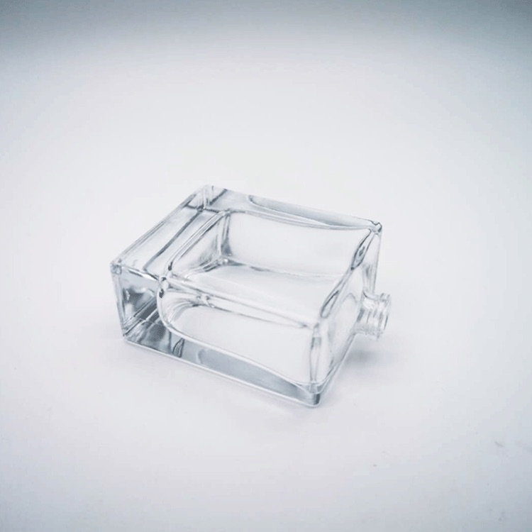 Wholesale spray perfume bottle transparent square 50ml customized glass perfume glass bottle for cosmetic