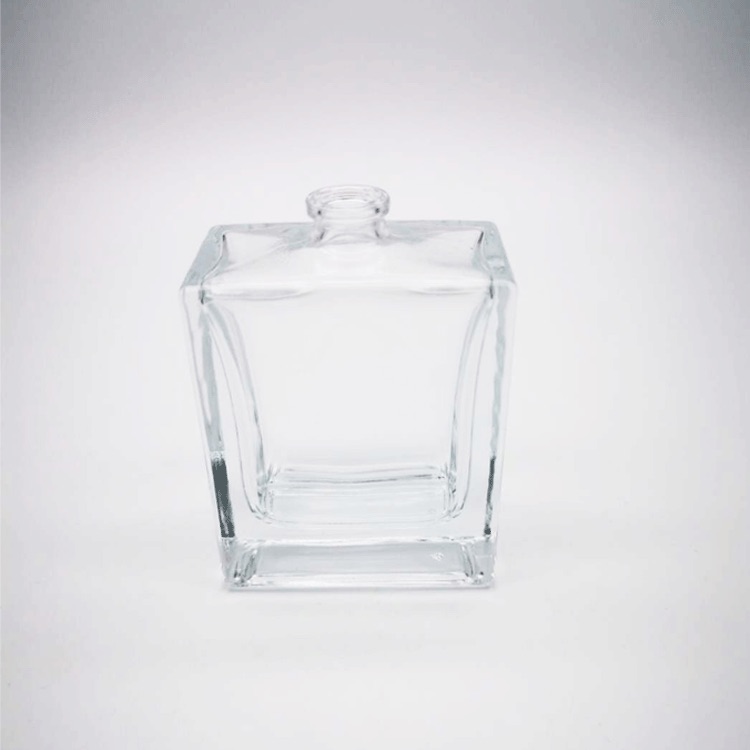 Wholesale spray perfume bottle transparent square 50ml customized glass perfume glass bottle for cosmetic