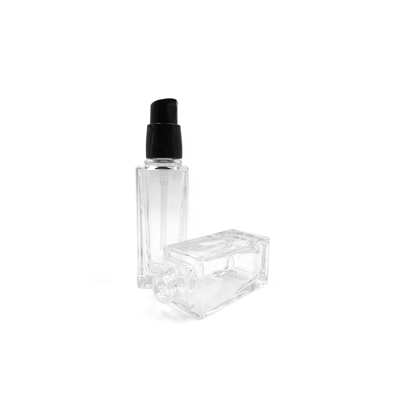 Wholesale square empty cosmetic lotion foundation packaging 15ml 20ml 30ml 40ml clear glass bottle with pump