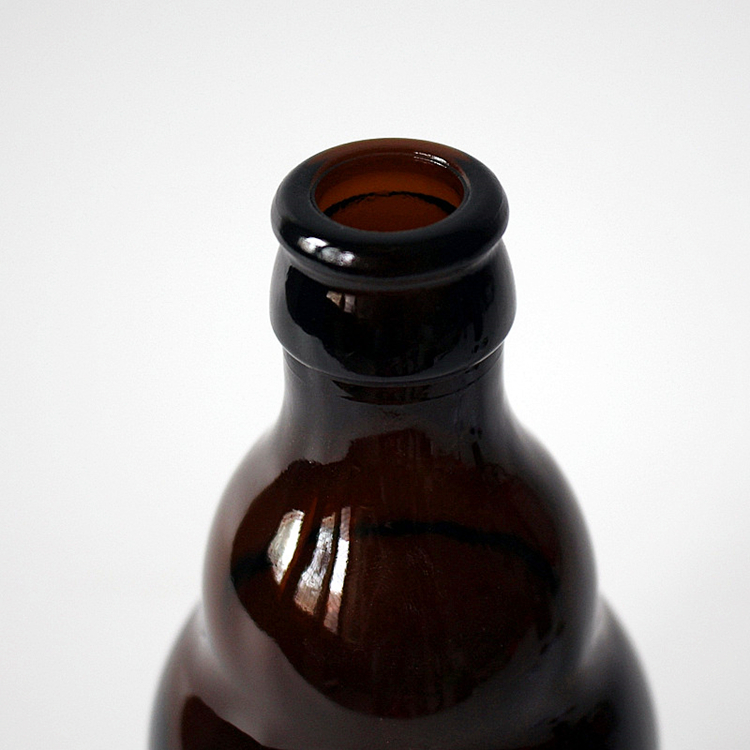 Wholesale stocked 330ml 33CL amber empty stubby glass beer bottle with crown cap