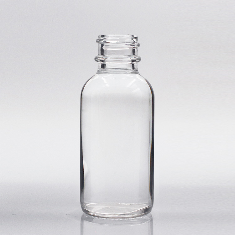 Wholesale transparent boston round glass bottle
