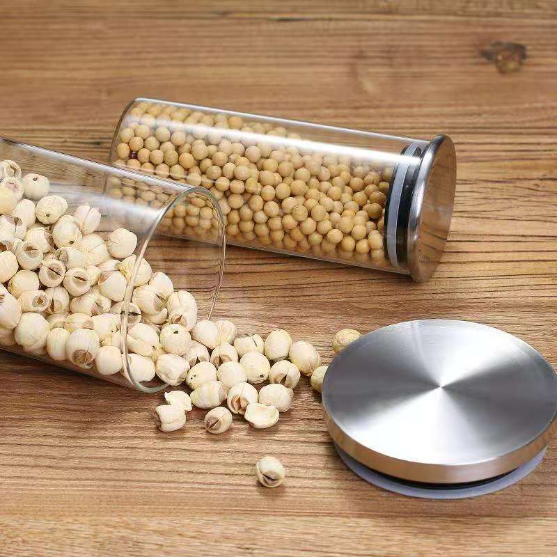 Wholesale transparent high borosilicate glass sealed storage jar with stainless steel cover tea food cereals snacks jar