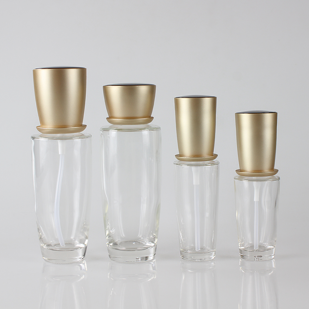 Wholesales 30ml 40ml 100ml 120ml glass cosmetic lotion pump bottle with gold cap packaging for skin care