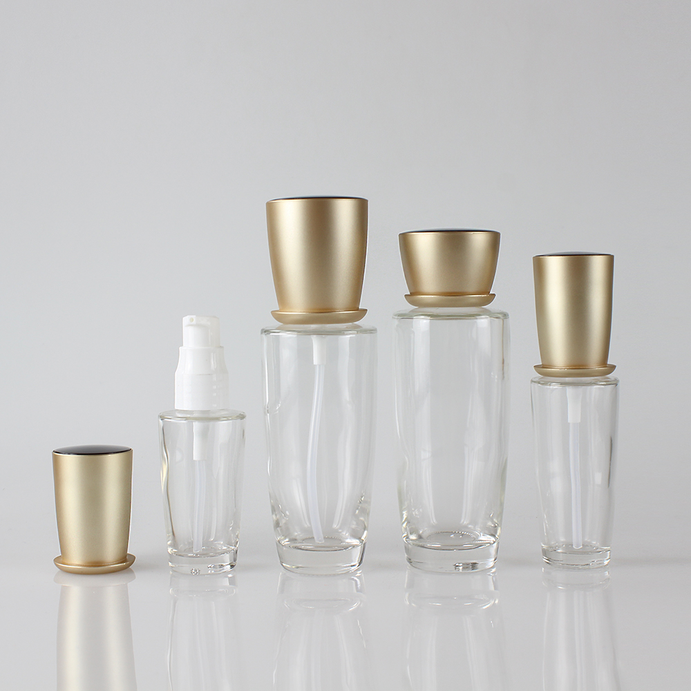 Wholesales 30ml 40ml 100ml 120ml glass cosmetic lotion pump bottle with gold cap packaging for skin care