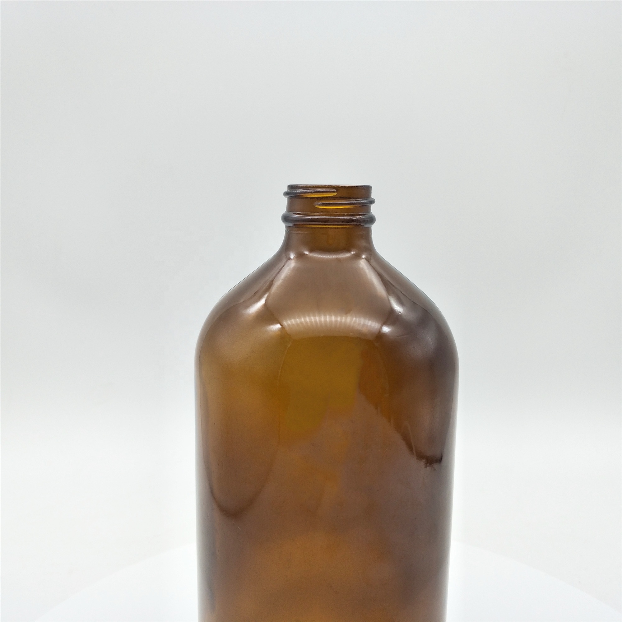 Wholesales 32oz Boston round amber glass bottle