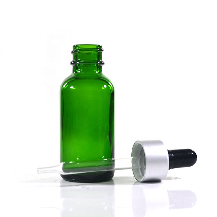 Wholesales Cosmetic essential oil package Boston round 1oz 2oz 30ml 60ml clear amber blue green frosted glass dropper bottle